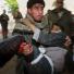 Palestinians carry a boy, injured during an Israeli army operation in Gaza