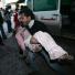A wounded Palestinian girl arrives at the Al-Shifa hospital