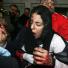 A wounded Palestinian girl is carried into a hospital in Gaza