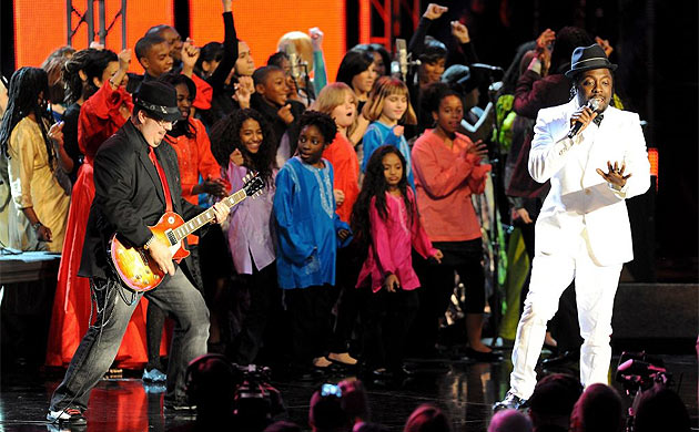 Singer Will.i.am performs during the Neighborhood Ball at the Washington Convention Center