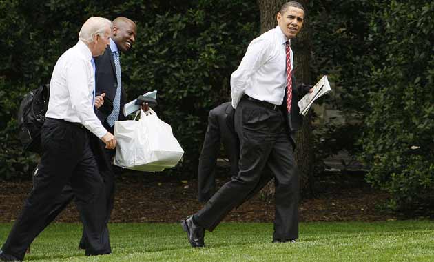 Barack Obama, Joe Biden and Reggie Love coming from Ray's Hell Burger