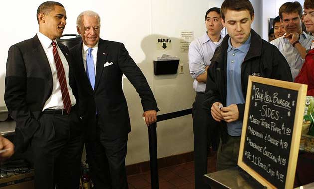 Barack Obama and Joe Biden wait in the ordering line at Ray's Hell Burger in Virginia