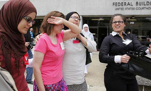 The mother of Ziyad Yaghi is consoled