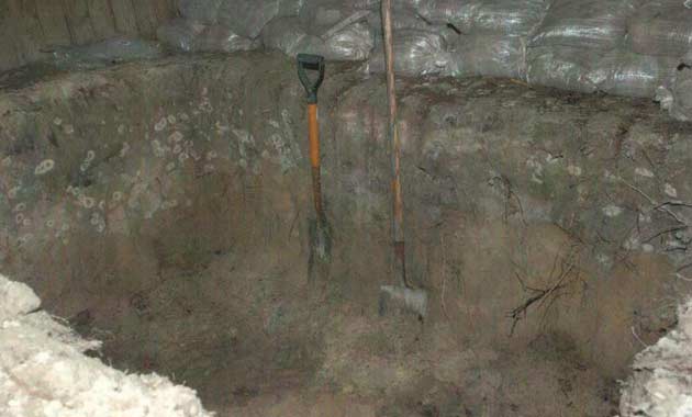 A pit underneath a house