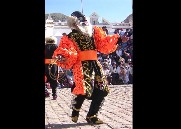 Oruro carnival Bolivia: slave-driver dancers