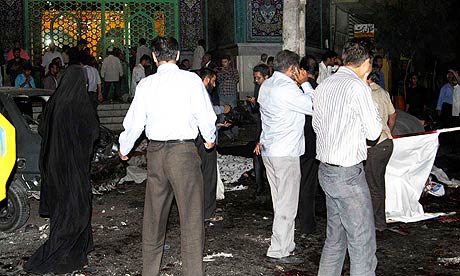 The aftermath of two suicide bombings outside a mosque in Zahedan,
 Iran.