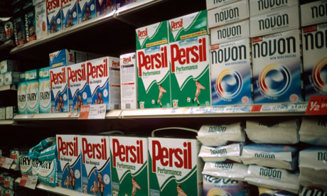 Packets of detergent on supermarket shelves