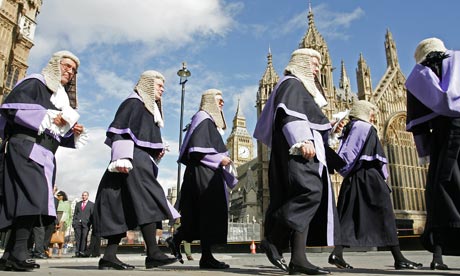 Judges wearing wigs and robes