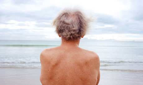 man looking at the sea