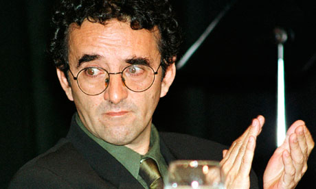 Chilean-born writer Roberto Bolano applauds during