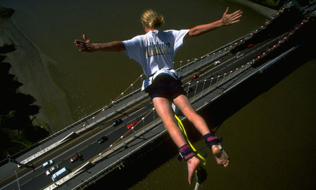 A bungee jumper plummets towards the ground