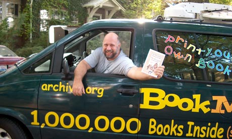 Michael Hart in his 'internet archive bookmobile' in 2002
