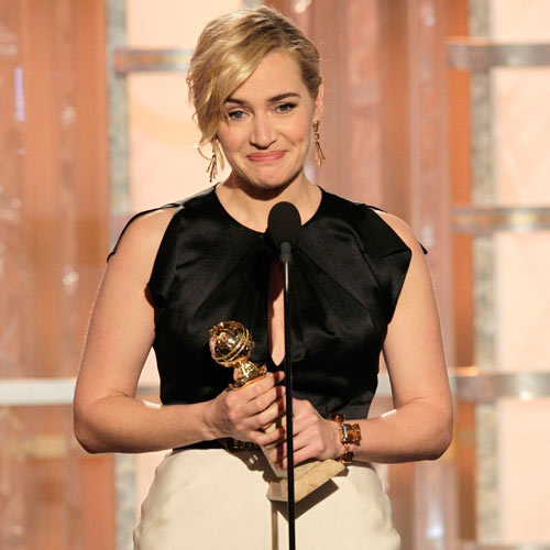 Actress Kate Winslet holds her award during the 69th Golden Globe Awards in Beverly Hills