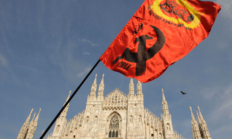 A communist flag being waved at Piazza del Duomo, Milan