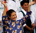 Erika Hernandez, 28, waves as she leaves the La Raza General hospital in Mexico city