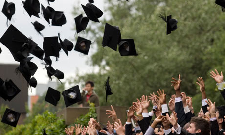 mortar boards in air