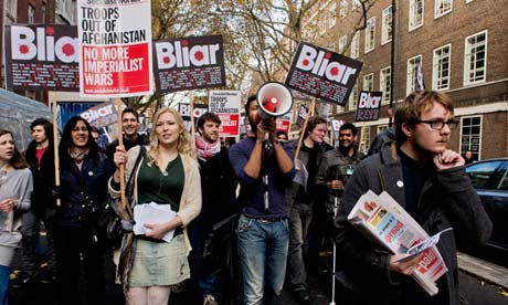 Protesters calling for Tony Blair’s arrest for war crimes march outside Senate House in London