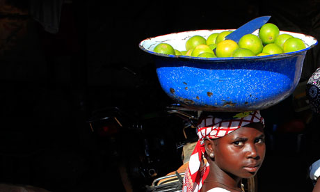 girl selling oranges