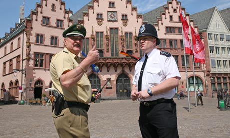 Police officers on the streets of Frankfurt two days before England's opening World Cup game in 2006