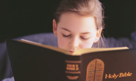 Girl reading the bible