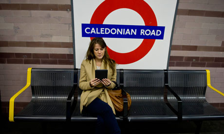 A woman with an e-reader
