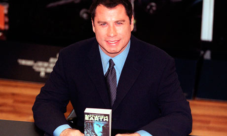 John Travolta signs copies of Battlefield Earth in London, 2000. 