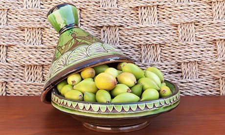 Argan nuts in a green plate.