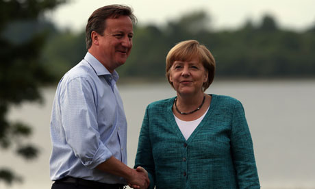 German chancellor Angela Merkel is greeted by David Cameron at the G8 summit in June