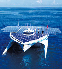 The MS Tûranor PlanetSolar passes Bora Bora in the Pacific on its voyage around the world