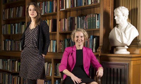 Labour MP Emma Reynolds (pink) and historian Claudia Renton at the Royal Society Library in London. 