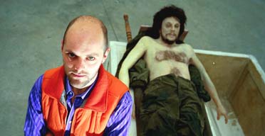 Gavin Turk with his 2000 work Death of Che
