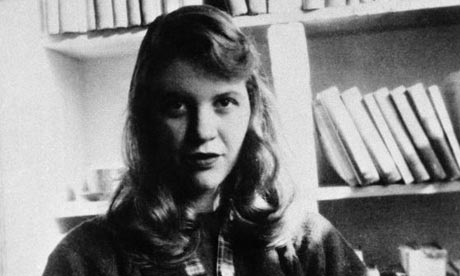 Poet Sylvia Plath in front of bookshelf
