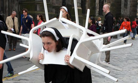  Edinburgh Festival Fringe act Passion of the Sorors walk along the Royal Mile