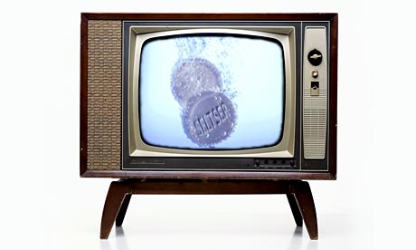 Hangover TV: a TV set showing two alka seltzer tablets fizzing