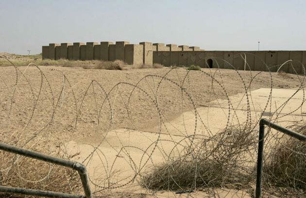 Barbed wires are seen in front of the Archeological site of Babylon about 80 kilometers, 50 miles, miles south of Baghdad, Iraq