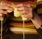 Young woman knitting