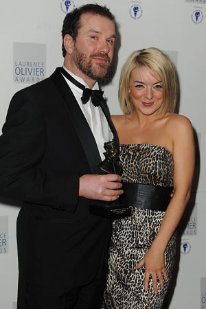 Douglas Hodge poses with his best actor in a musical Olivier award