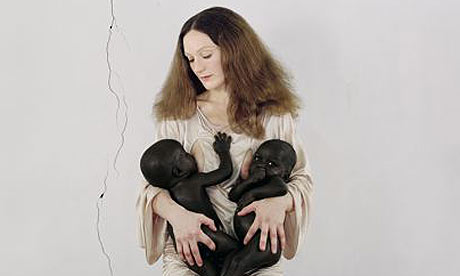 A still from Vanessa Beecroft's The Art Star and the Sudanese Twins