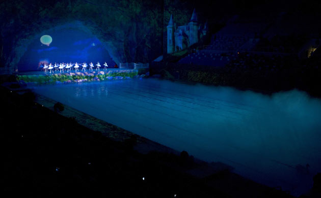Dancers perform Swan Lake inside the National Aquatics Centre in Beijing
