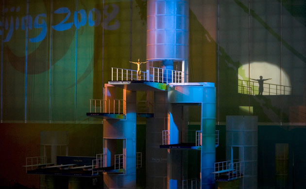 Dancers perform Swan Lake inside the National Aquatics Centre in Beijing