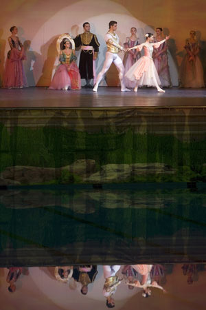 Dancers perform Swan Lake inside the National Aquatics Centre in Beijing
