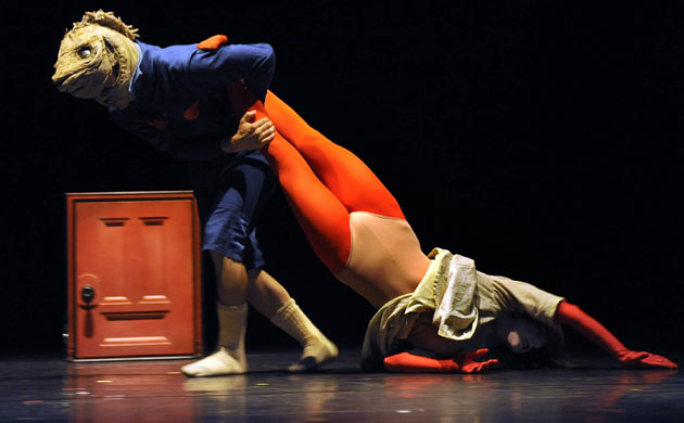 Dancers with the group Pilobolus perform a scene from 2b