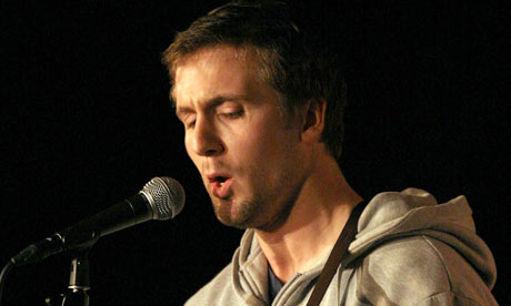 Tom Basden during his comedy standup act