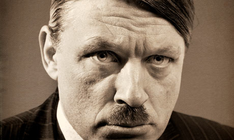 Comedian Richard Herring wearing a Hitler moustache