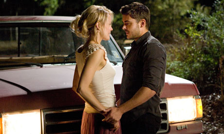 Taylor Schilling and Zac Efron in The Lucky One