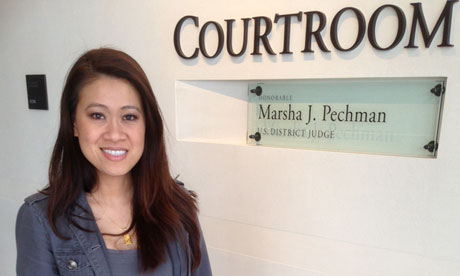 Actor Junie Hoang poses outside a courtroom in Seattle