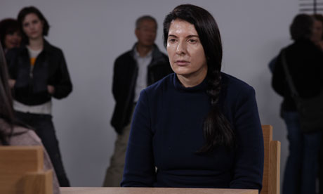 Marina Abramović performs The Artist Is Present, which provided the inspiration for Jay-Z's latest v