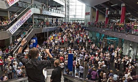 Critical mass … Simon Halsey conducts Crowd Out at Millenium Point, Birmingham.