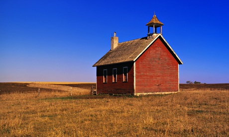 Red Schoolhouse on a Prairie