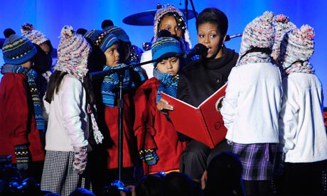Michelle Obama reads 'The Night Before Christmas' to children at the White House.